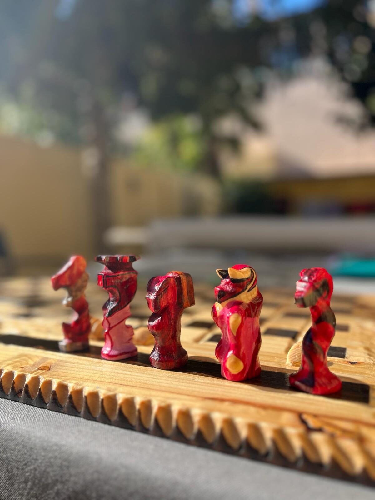 Hand-carved Hell knights on the wooden board